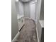 Upper hallway with plush carpeting and built-in storage at 427 E Mayfield Dr, San Tan Valley, AZ 85143