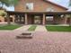Covered patio, artificial turf, and fire pit at 427 E Mayfield Dr, San Tan Valley, AZ 85143