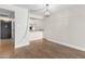 Dining area with wood-look tile floor and chandelier at 7625 E Camelback Rd # A418, Scottsdale, AZ 85251