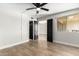 Bedroom with wood-look floors and access to other rooms at 7625 E Camelback Rd # A418, Scottsdale, AZ 85251