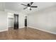 Bright bedroom with wood-look floors and ceiling fan at 7625 E Camelback Rd # A418, Scottsdale, AZ 85251