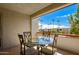 Private balcony with glass table and chairs at 7625 E Camelback Rd # A418, Scottsdale, AZ 85251