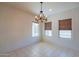 Bright dining room featuring a rustic chandelier at 11040 E Tumbleweed Ave, Mesa, AZ 85212