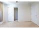 Bright bedroom with sliding closet doors and an additional door at 11040 E Tumbleweed Ave, Mesa, AZ 85212