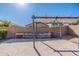 Backyard patio area with pergola at 11040 E Tumbleweed Ave, Mesa, AZ 85212