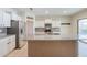 Modern kitchen with granite countertops and stainless steel appliances at 11040 E Tumbleweed Ave, Mesa, AZ 85212