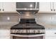 Stainless steel gas range with modern controls at 11040 E Tumbleweed Ave, Mesa, AZ 85212