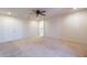 Large bedroom with access to bathroom and double door closet at 11040 E Tumbleweed Ave, Mesa, AZ 85212