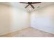 Spacious bedroom with ceiling fan and neutral walls at 11040 E Tumbleweed Ave, Mesa, AZ 85212