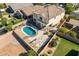 Two-story house with pool and pergola, aerial view at 11040 E Tumbleweed Ave, Mesa, AZ 85212