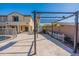 Backyard with pergola, patio, and partial pool view at 11040 E Tumbleweed Ave, Mesa, AZ 85212