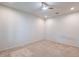Spacious bedroom with ceiling fan and neutral decor at 11040 E Tumbleweed Ave, Mesa, AZ 85212