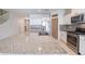 Modern kitchen with granite countertops and stainless steel appliances at 11040 E Tumbleweed Ave, Mesa, AZ 85212