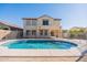 Inviting kidney-shaped pool in the backyard at 11040 E Tumbleweed Ave, Mesa, AZ 85212