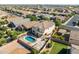 Two-story house, pool, and backyard, aerial neighborhood view at 11040 E Tumbleweed Ave, Mesa, AZ 85212