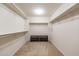 Large walk-in closet with double hanging rods and shelving at 11040 E Tumbleweed Ave, Mesa, AZ 85212