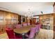 Elegant dining room featuring a large table and chandelier at 7175 E Camelback Rd # 107, Scottsdale, AZ 85251