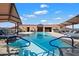 Resort-style rooftop pool with surrounding patio at 7175 E Camelback Rd # 107, Scottsdale, AZ 85251