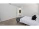 Bright bedroom with carpeted floor and a double bed at 5837 N 89Th Dr, Glendale, AZ 85305
