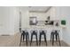 Modern kitchen with white cabinets and granite countertop at 5837 N 89Th Dr, Glendale, AZ 85305