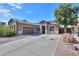 House exterior with driveway and landscaping at 1594 E Desert Breeze Dr, Casa Grande, AZ 85122