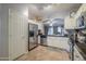 Kitchen with white cabinets, granite counters, and stainless steel appliances at 1594 E Desert Breeze Dr, Casa Grande, AZ 85122