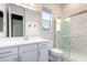 Clean bathroom with white vanity, a glass shower, and modern fixtures at 267 W Amherst St, San Tan Valley, AZ 85143