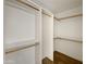 Large walk-in closet with double hanging rods at 2711 N Olympic Cir, Mesa, AZ 85215