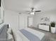 Bright bedroom with double door closet and ceiling fan at 2711 N Olympic Cir, Mesa, AZ 85215