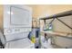 Stackable washer and dryer with storage shelving at 14300 W Bell Rd # 35, Surprise, AZ 85374