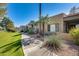 Building exterior showcasing attractive landscaping and walkway at 14300 W Bell Rd # 35, Surprise, AZ 85374