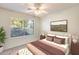 Bedroom with large window and neutral decor at 14300 W Bell Rd # 35, Surprise, AZ 85374