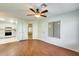 Spacious living room featuring hardwood floors and ceiling fan at 14300 W Bell Rd # 35, Surprise, AZ 85374