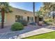 Attractive desert landscaping leads to condo entrance at 14300 W Bell Rd # 35, Surprise, AZ 85374