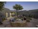 Stone patio with a tranquil pool and spa, nestled near the house at 10040 E Happy Valley Rd # 1010, Scottsdale, AZ 85255