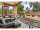 Relaxing patio with wicker furniture, perfect for outdoor enjoyment at 11500 E Cochise Dr # 1047, Scottsdale, AZ 85259