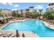 Relaxing community pool with lounge chairs at 5350 E Deer Valley Dr # 2399, Phoenix, AZ 85054