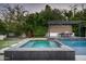 Inviting pool and spa with a built-in outdoor kitchen and pergola at 6201 E Calle Redonda --, Scottsdale, AZ 85251