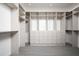 Large walk-in closet with ample shelving and drawers at 6201 E Calle Redonda --, Scottsdale, AZ 85251