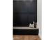 Custom built-in storage with bench seating and sleek, black cabinetry at 6201 E Calle Redonda --, Scottsdale, AZ 85251