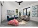 Relaxing living room with comfortable seating and a cowhide rug at 6201 E Calle Redonda --, Scottsdale, AZ 85251