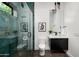 Modern bathroom with teal tile shower and floating vanity at 6201 E Calle Redonda --, Scottsdale, AZ 85251