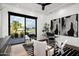 Home office with glass desk, comfortable seating, and large window at 6201 E Calle Redonda --, Scottsdale, AZ 85251