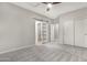 Bedroom with barn door and double closets at 32029 N 20Th Ln, Phoenix, AZ 85085