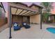 Modern pergola with comfortable lounge chairs near the pool at 32029 N 20Th Ln, Phoenix, AZ 85085