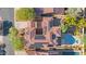 Aerial view of two-story house with solar panels, pool, and landscaped yard at 32029 N 20Th Ln, Phoenix, AZ 85085