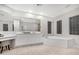 Bathroom boasts double sinks, a large tub, and a glass-block window at 32029 N 20Th Ln, Phoenix, AZ 85085