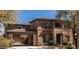 Two-story home with a covered carport and solar panels at 32029 N 20Th Ln, Phoenix, AZ 85085