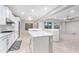 Open kitchen with large island and stainless steel appliances at 32029 N 20Th Ln, Phoenix, AZ 85085