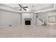 Living room featuring a fireplace and staircase at 32029 N 20Th Ln, Phoenix, AZ 85085